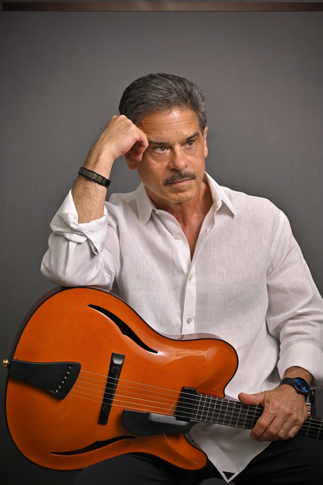 Where the Borrowed Songs on Satisfied by John Basile Came From